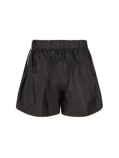 Prada Re-nylon Shorts In Black