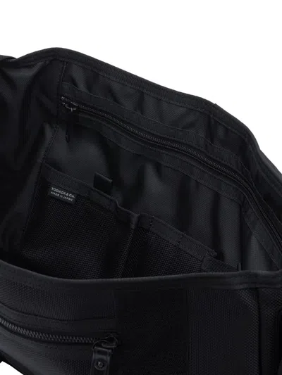 Porter-yoshida & Co . Crossbody Bags In Black