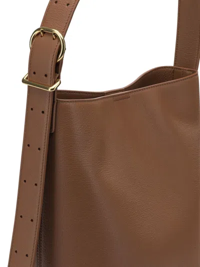 Jil Sander Small Cannolo Grained Leather Shoulder Bag In Brown