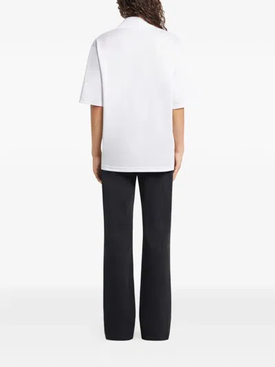 Courrèges Polo Shirt Sports Style Short Sleeves In White