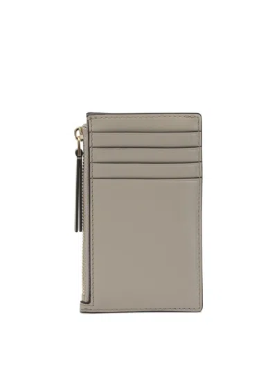 Tory Burch Quilted Purses And Card Holders Collection In Brown