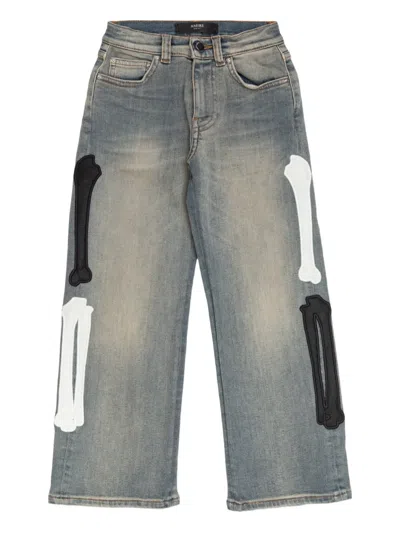 Amiri Bone Appliqué Jeans In Blue