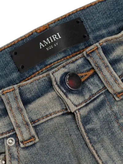 Amiri Bone Appliqué Jeans In Blue