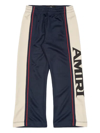Amiri Stripe Logo Track Pants In Blue