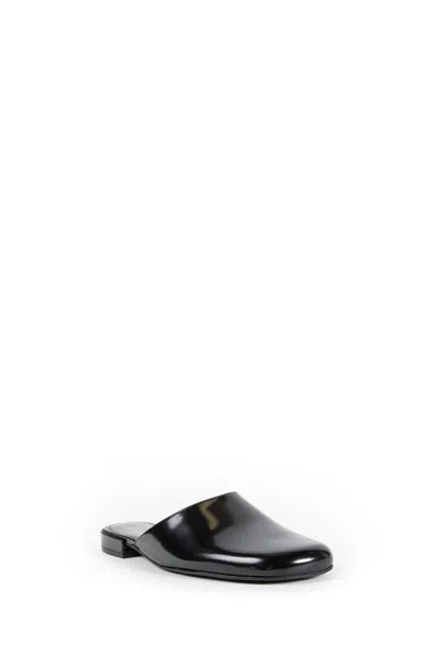 The Row Penelope Leather Mules In Black