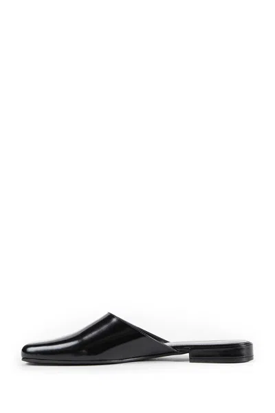 The Row Penelope Leather Mules In Black