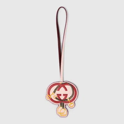 Gucci Printed Bag Charm In Gold