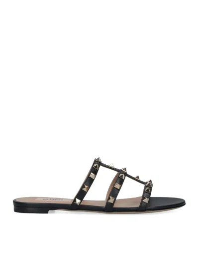 Valentino Rockstud Slide Sandal In Laminated Nappa With Cabochon In Black