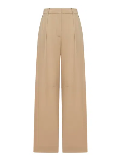 Loewe Tailored Barrel Wool Trousers In Brown