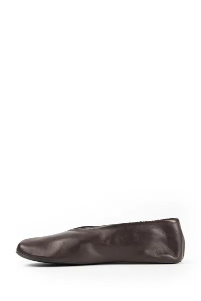 The Row Stella Slippers In Leather And Shearling In Brown