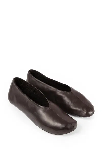 The Row Stella Slippers In Leather And Shearling In Brown