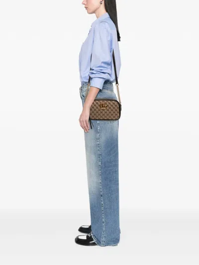 Pre-owned Gucci 2016-2025 Small Gg Marmont Matelasse Gg Canvas And Leather Crossbody Bag In Brown