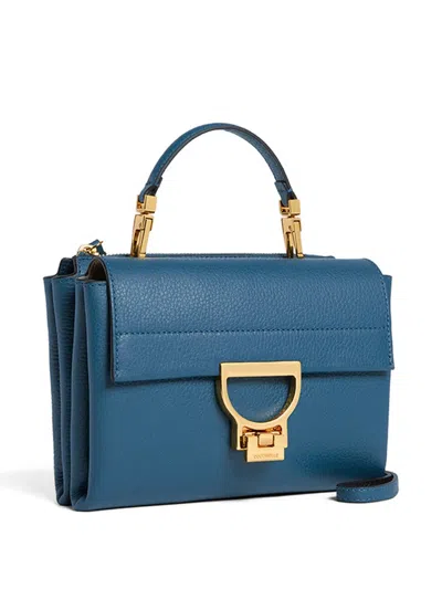 Coccinelle Small Arlettis Cross Body Bag In Blue