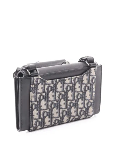 Pre-owned Dior 2010-2025 Oblique Canvas And Leather Elite Saddle Crossbody Bag In Brown