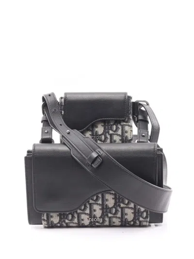 Pre-owned Dior 2010-2025 Oblique Canvas And Leather Elite Saddle Crossbody Bag In Brown