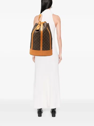 Pre-owned Louis Vuitton 1992 Monogram Randonnee Gm Backpack In Brown