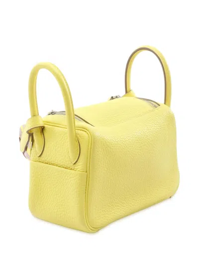 Pre-owned Hermes 2022 Mini Taurillon Clemence Lindy Satchel In Yellow