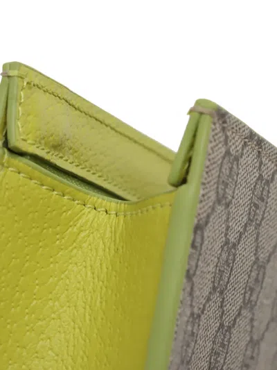 Pre-owned Gucci 2016-2025 Small Bicolor Gg Supreme Pouch In Green