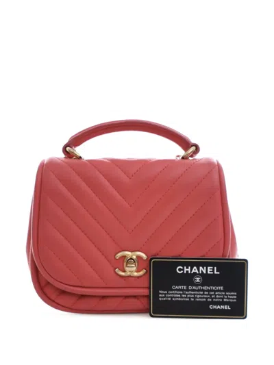 Pre-owned Chanel 2017-2018 Mini Cc Chevron Lambskin Reversed Round Flap Satchel In Pink