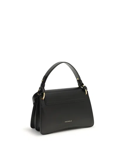 Coccinelle Black Calf Leather Bos Taurus Handbag In Black