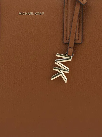 Michael Kors Brown Handbag With Metallic Lettering Logo And Pendant On The Front In Leather Woman In Brown