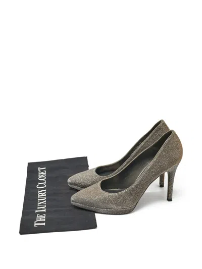 Pre-owned Stuart Weitzman Metallic Pumps In Gold