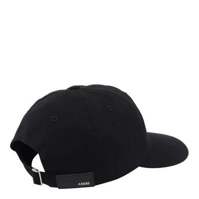 Amiri Logo Embroidered Curved Peak Hat In Black