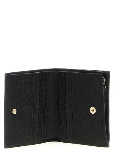 Valentino Garavani Compact Wallet Featuring Studded Texture In Black