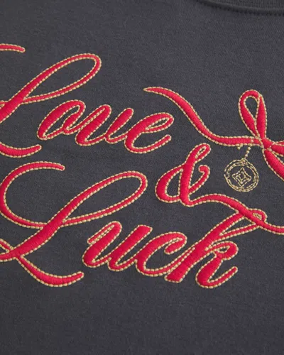 Hollister Love & Luck Graphic Baby Tee In Gray