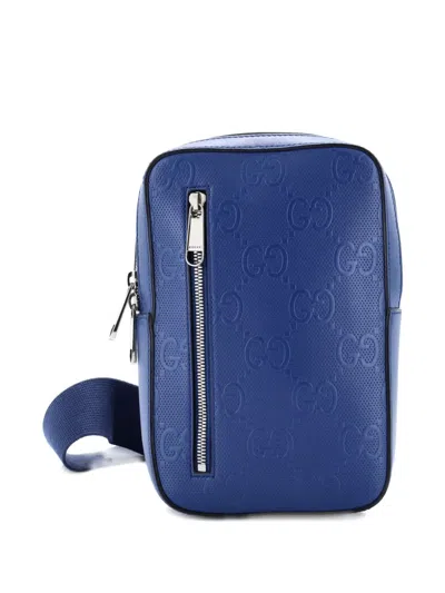 Pre-owned Gucci Sling Gg Embossed Perforated Leather Backpack In Blue