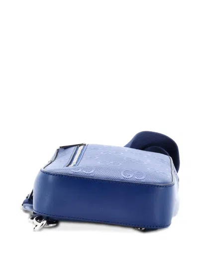 Pre-owned Gucci Sling Gg Embossed Perforated Leather Backpack In Blue