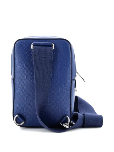 Pre-owned Gucci Sling Gg Embossed Perforated Leather Backpack In Blue