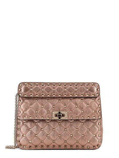 Valentino Laminated Leather Rockstud Spike Crossbody Bag In Pink