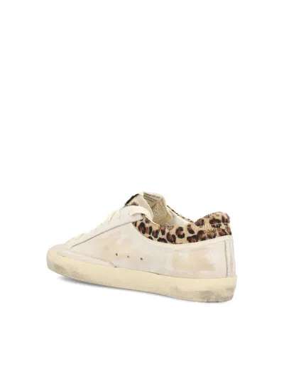 Golden Goose Super Star Calf Hair And Suede-trimmed Distressed Leather Sneakers In Neutral