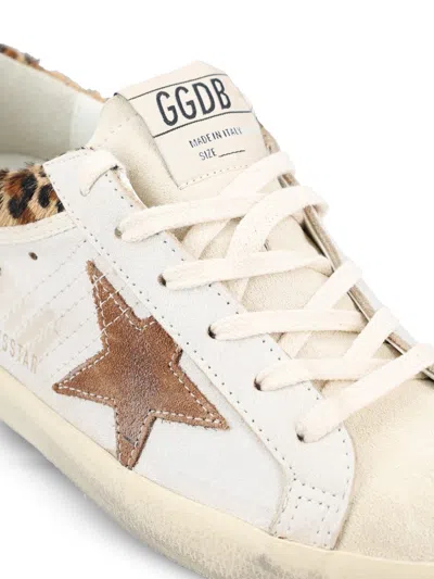 Golden Goose Super Star Calf Hair And Suede-trimmed Distressed Leather Sneakers In Neutral