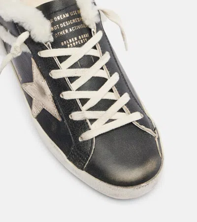Golden Goose Super-star Shearling-trimmed Leather Sneakers In Black