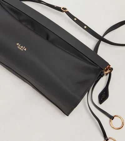 Alaïa Alaia Women Le Click East West Medium Leather Bag In Black