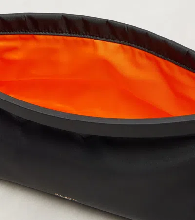 Alaïa Alaia Women Le Click East West Medium Leather Bag In Black