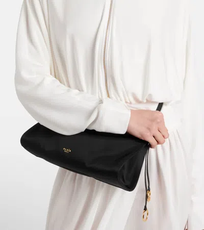 Alaïa Alaia Women Le Click East West Medium Leather Bag In Black