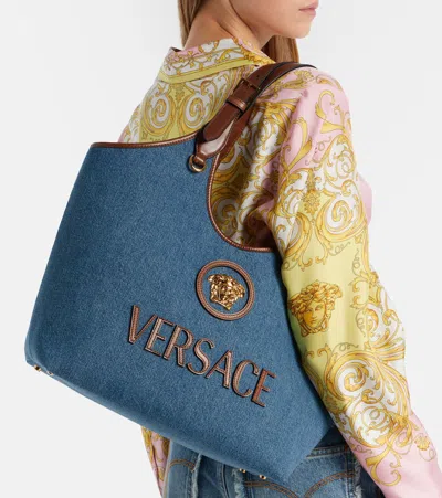 Versace La Medusa Leather-trimmed Denim Tote In Blue
