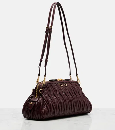 Miu Miu Matelassé Leather Clutch In Burgundy