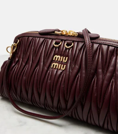 Miu Miu Matelassé Leather Clutch In Burgundy