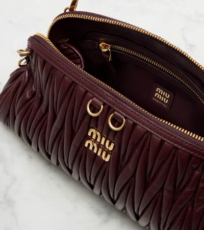 Miu Miu Matelassé Leather Clutch In Burgundy