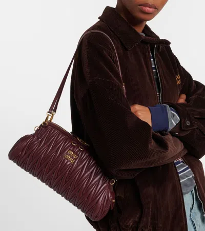 Miu Miu Matelassé Leather Clutch In Burgundy