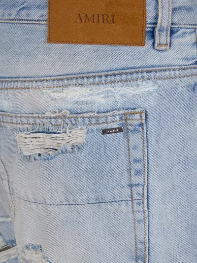Amiri Distressed-effect Denim Jeans In Blue