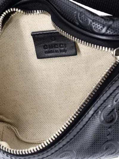 Pre-owned Gucci Gg Embossed Perforated Leather Small Belt Bag In Black