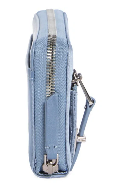 Tumi Zip Around Continental Wallet In Blue