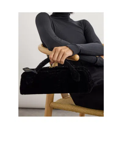 Alaïa Le Teckel Leather-trimmed Shearling Clutch In Black