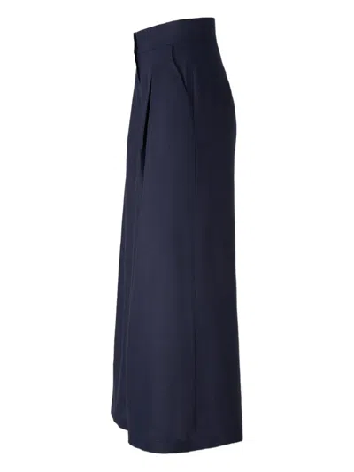 Andres Otalora Pleated Flared Trousers In Blue