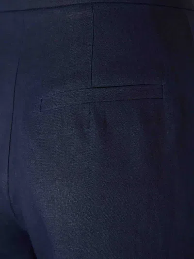 Andres Otalora Pleated Flared Trousers In Blue